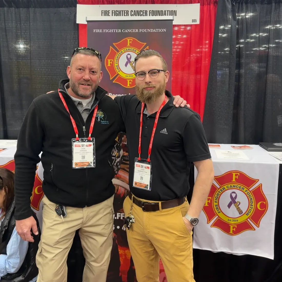 Joshua Herrington with Don Zender at the Fire Fighter Cancer Foundation booth