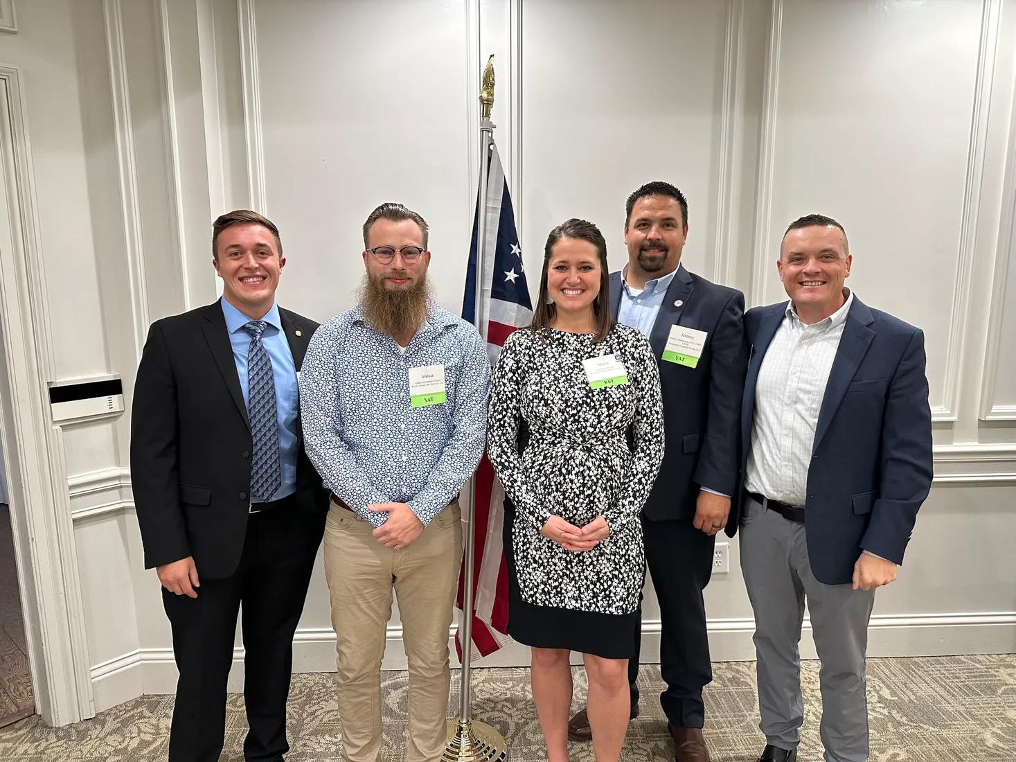 Joshua Herrington with four colleagues at a NAIFA Young Advisor Team event